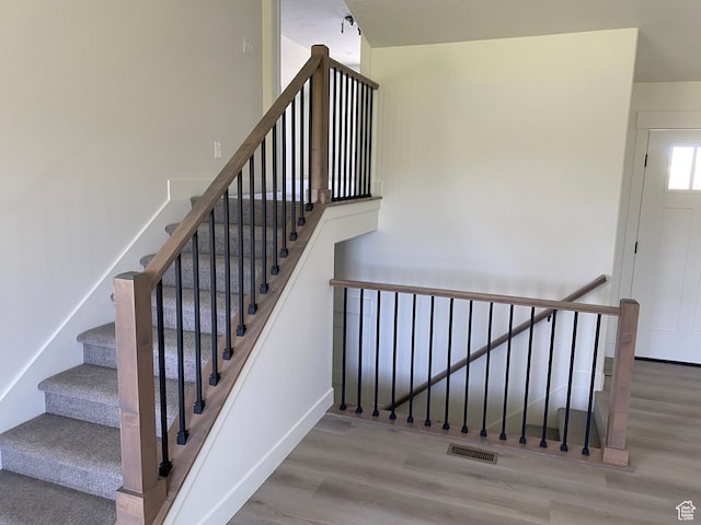 4618 W 75 N Unit 404, West Point, UT 84015 - stairway featuring wood finished floors