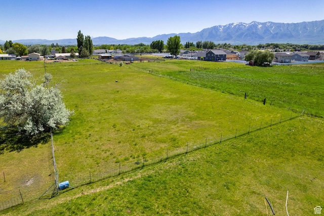 1435 W 600 S, Logan, UT 84321 - aerial view of sparsely populated area featuring a mountain backdrop and a pastoral area