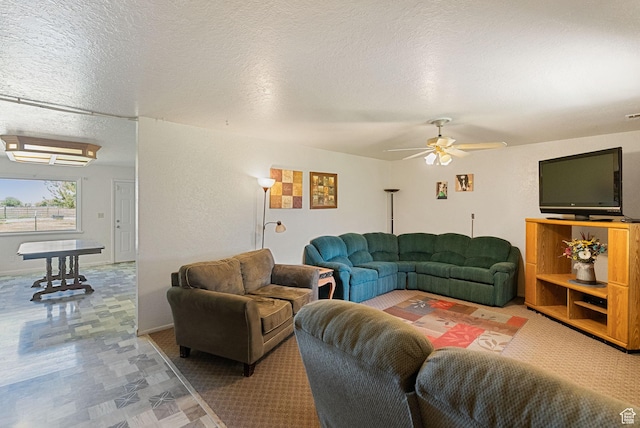 1435 W 600 S, Logan, UT 84321 - living room featuring ceiling fan and a textured ceiling