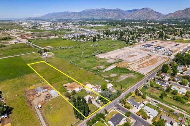 1435 W 600 S, Logan, UT 84321 - aerial overview of property's location featuring property parcel outlined and a mountain backdrop