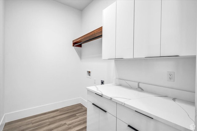 133 E Terrace Ln, Ivins, UT 84738 - laundry room with hookup for an electric dryer, washer hookup, light wood-style floors, baseboards, and cabinet space