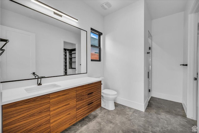 133 E Terrace Ln, Ivins, UT 84738 - full bathroom with vanity, toilet, baseboards, and a closet