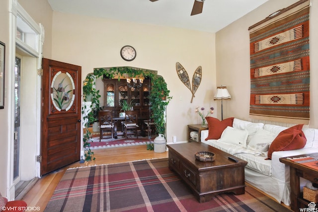 211 E 100 N, Midway, UT 84049 - living area with wood finished floors, ceiling fan, and healthy amount of natural light