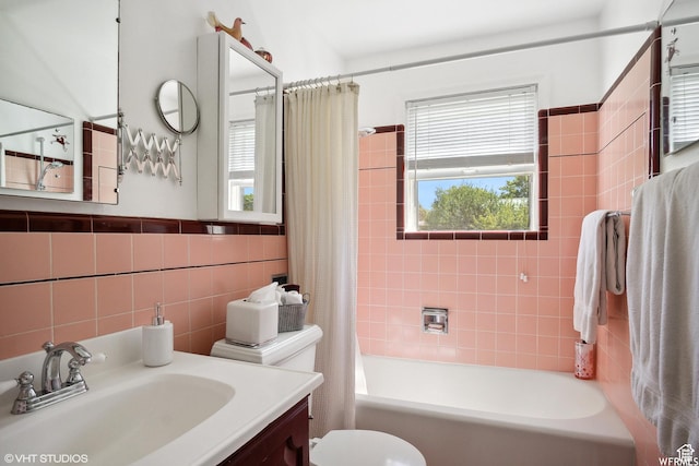 211 E 100 N, Midway, UT 84049 - bathroom with tile walls, shower / bath combo, vanity, and toilet