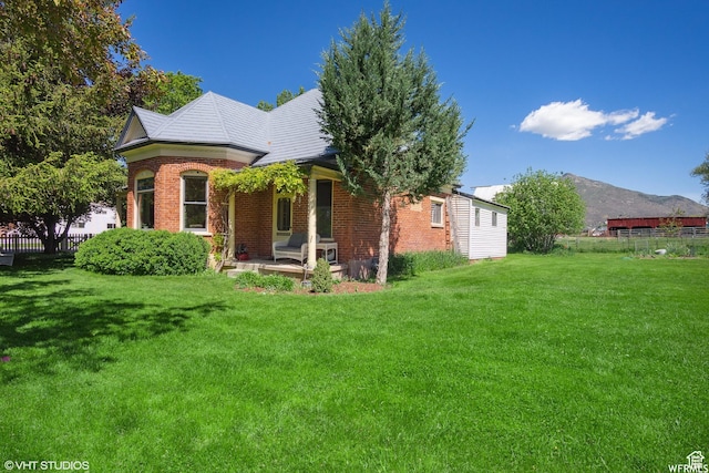 211 E 100 N, Midway, UT 84049 - view of front facade with a mountain view and brick siding