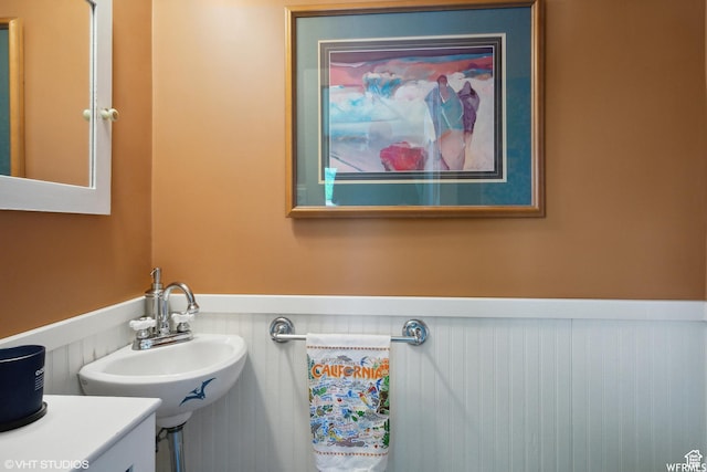 211 E 100 N, Midway, UT 84049 - half bath featuring a wainscoted wall and a sink