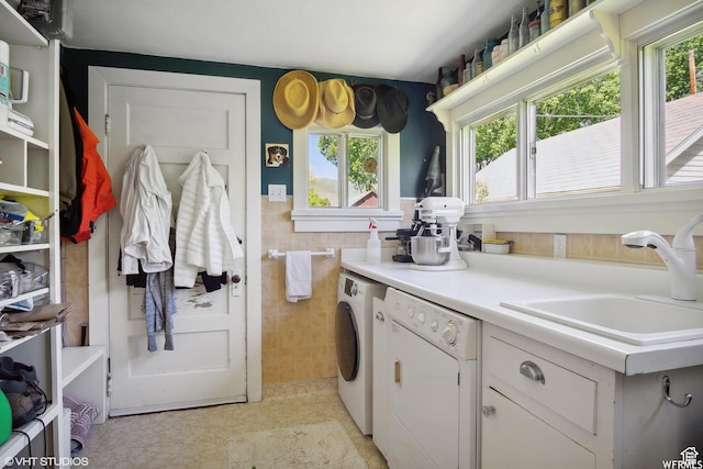 211 E 100 N, Midway, UT 84049 - kitchen with a sink, dishwashing machine, separate washer and dryer, white cabinets, and light countertops