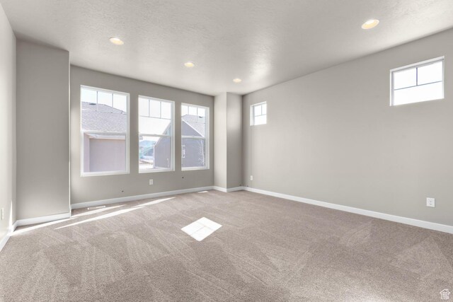 6564 N Bald Unit D195, Eagle Mountain, UT 84005 - empty room with carpet, baseboards, and recessed lighting