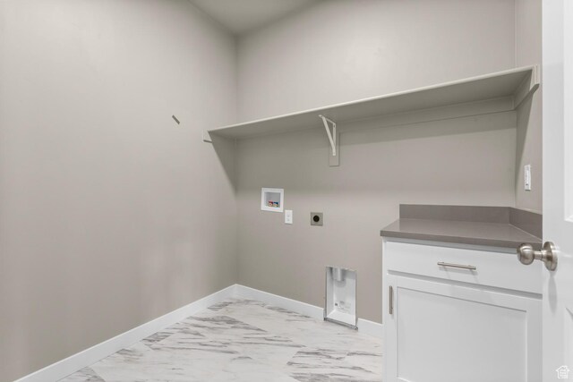 6564 N Bald Unit D195, Eagle Mountain, UT 84005 - laundry room featuring electric dryer hookup, light marble finish floors, hookup for a washing machine, and baseboards