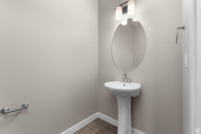 6564 N Bald Unit D195, Eagle Mountain, UT 84005 - bathroom featuring baseboards and wood finished floors