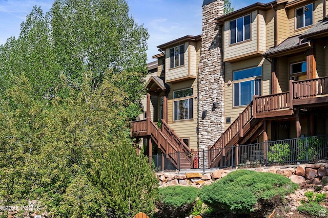 5521 N Freestyle Way, Park City, UT 84098 - back of property featuring stairs and a chimney