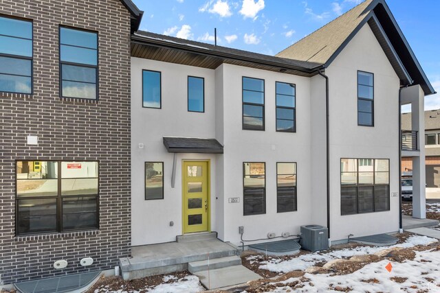 1822 N 180 E, Heber City, UT 84032 - townhome / multi-family property with stucco siding, central AC, and brick siding