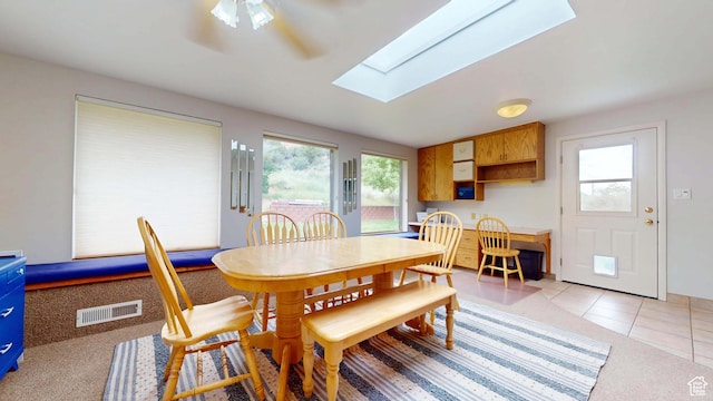 470 E Parkway Dr, Cedar City, UT 84721 - dining space featuring a skylight, a ceiling fan, and light tile patterned flooring