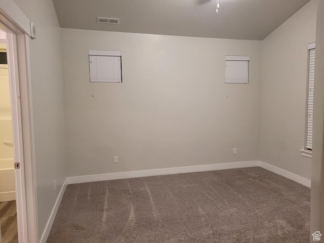 14474 Renner Ln Unit 302, Herriman, UT 84096 - empty room with dark colored carpet and baseboards