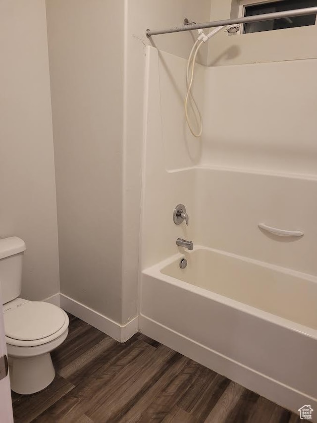 14474 Renner Ln Unit 302, Herriman, UT 84096 - full bath with toilet,  shower combination, wood finished floors, and baseboards
