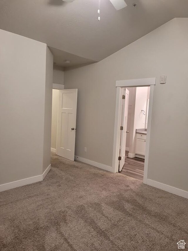 14474 Renner Ln Unit 302, Herriman, UT 84096 - carpeted empty room with baseboards and lofted ceiling