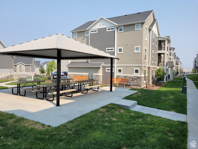 14474 Renner Ln Unit 302, Herriman, UT 84096 - surrounding community with a gazebo, a residential view, and a yard
