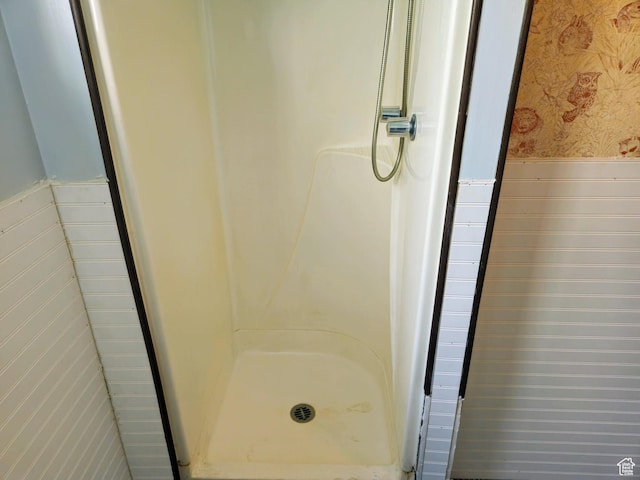 719 Adams St, Montpelier, ID 83254 - full bath with wainscoting, wallpapered walls, and a stall shower