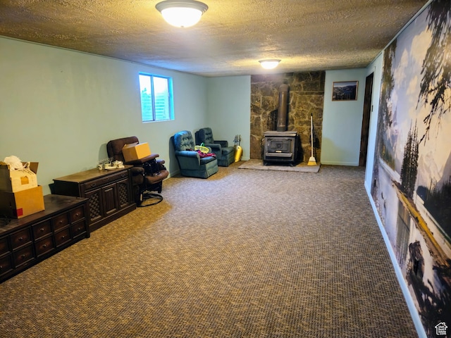 719 Adams St, Montpelier, ID 83254 - living area featuring a textured ceiling, a wood stove, and carpet floors