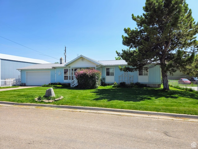 719 Adams St, Montpelier, ID 83254 - single story home with a garage and concrete driveway