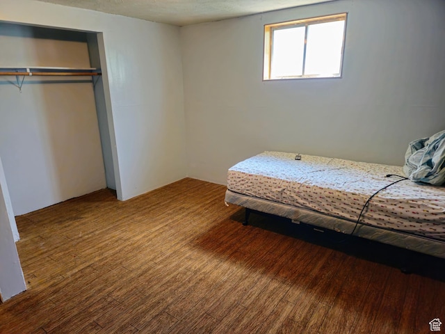 719 Adams St, Montpelier, ID 83254 - bedroom featuring wood finished floors and a closet