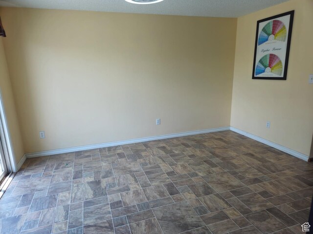 719 Adams St, Montpelier, ID 83254 - unfurnished room featuring baseboards