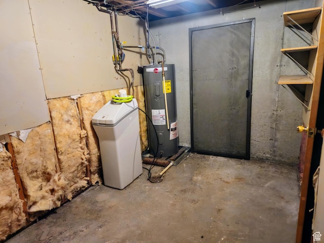 719 Adams St, Montpelier, ID 83254 - unfinished basement featuring water heater and a water softener system