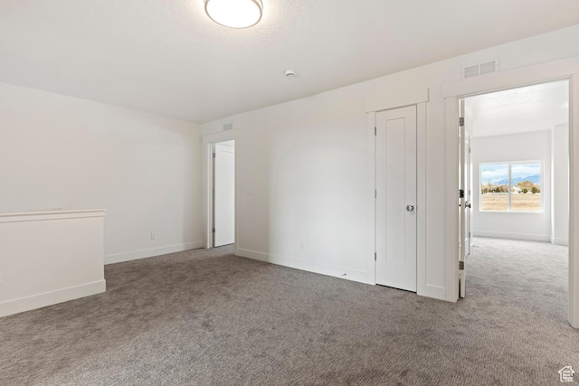 2734 S Allison Way Unit 213, Syracuse, UT 84075 - carpeted spare room with baseboards