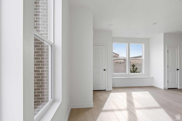 2854 S Ritter Row Unit 52, West Valley City, UT 84128 - corridor featuring wood finished floors and baseboards