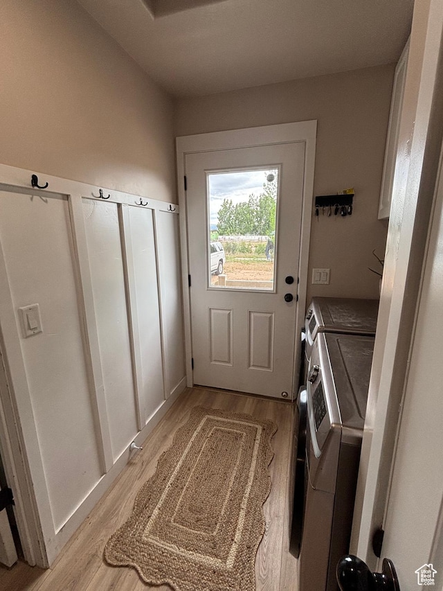 1574 S 2000 E, Vernal, UT 84078 - washroom featuring separate washer and dryer and light wood-style floors