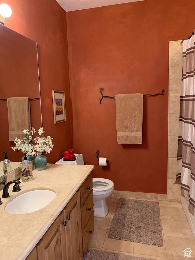 5420 N Bobsled Blvd Unit 202, Park City, UT 84098 - bathroom with vanity, toilet, tile patterned flooring, and a shower with shower curtain