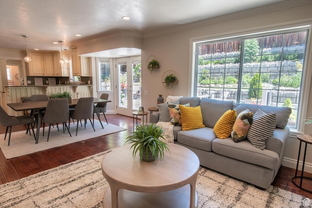 1814 N Heather Dr, Orem, UT 84097 - living area with dark wood-type flooring, plenty of natural light, crown molding, baseboards, and recessed lighting