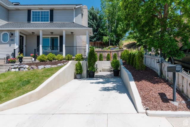 1814 N Heather Dr, Orem, UT 84097 - view of front of home featuring covered porch and roof with shingles