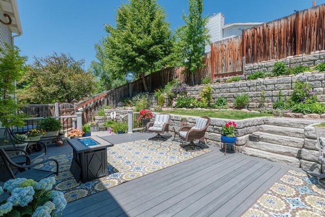 1814 N Heather Dr, Orem, UT 84097 - wooden terrace featuring an outdoor fire pit and a fenced backyard