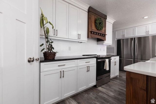 425 W 1080 S, Monroe, UT 84754 - kitchen featuring stainless steel appliances, a textured ceiling, dark wood-type flooring, white cabinetry, and recessed lighting