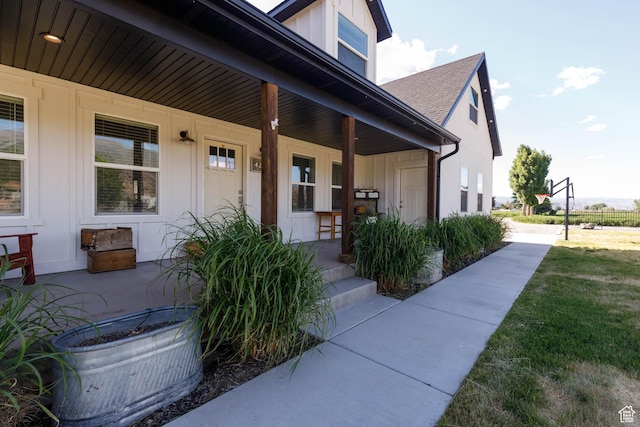 425 W 1080 S, Monroe, UT 84754 - entrance to property featuring a porch, a shingled roof, and board and batten siding