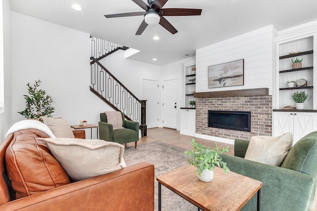 1797 N Avocet Dr, Salem, UT 84653 - living area featuring stairway, a ceiling fan, wood finished floors, built in features, and recessed lighting