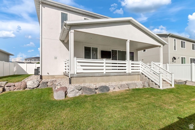 1797 N Avocet Dr, Salem, UT 84653 - view of front of home with central AC unit, covered porch, and stucco siding