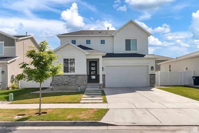 1797 N Avocet Dr, Salem, UT 84653 - view of front of property featuring stone siding, an attached garage, and driveway
