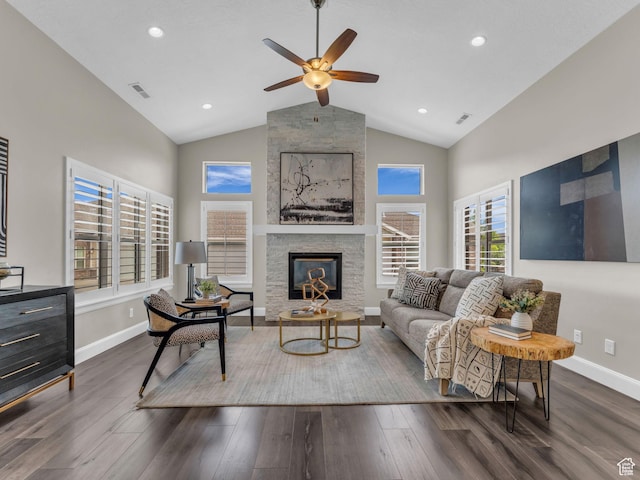 10486 S Harvest Glory Dr W Unit 125, South Jordan, UT 84095 - living room featuring baseboards, a ceiling fan, dark wood finished floors, high vaulted ceiling, and a stone fireplace