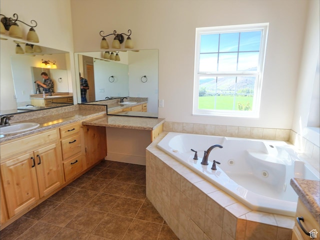 2307 Maple Leaf Dr, Cove, UT 84320 - bathroom featuring a whirlpool tub and vanity