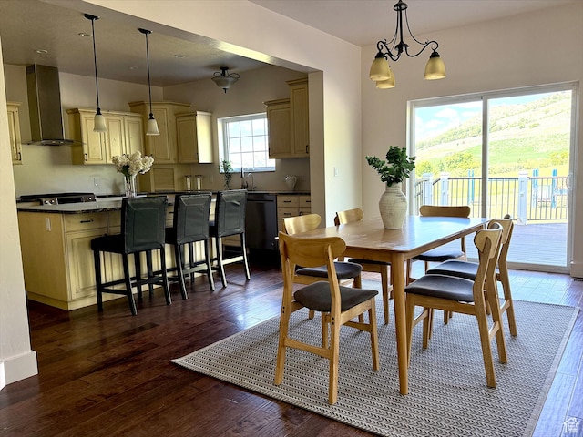 2307 Maple Leaf Dr, Cove, UT 84320 - dining room with dark wood finished floors and a chandelier