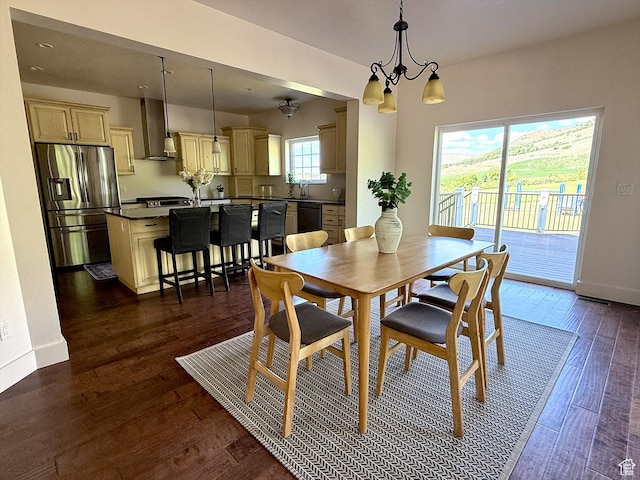2307 Maple Leaf Dr, Cove, UT 84320 - dining room with dark wood finished floors and a chandelier
