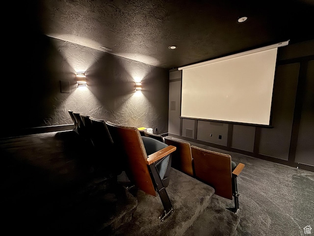 2307 Maple Leaf Dr, Cove, UT 84320 - home theater featuring a textured wall, a textured ceiling, and carpet flooring