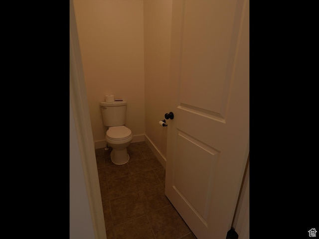2307 Maple Leaf Dr, Cove, UT 84320 - bathroom featuring tile patterned flooring, toilet, and baseboards