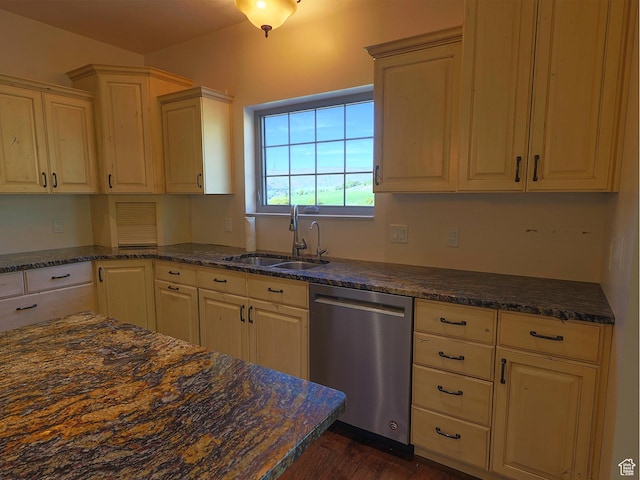 2307 Maple Leaf Dr, Cove, UT 84320 - kitchen with stainless steel dishwasher, a sink, dark wood-type flooring, and dark stone countertops