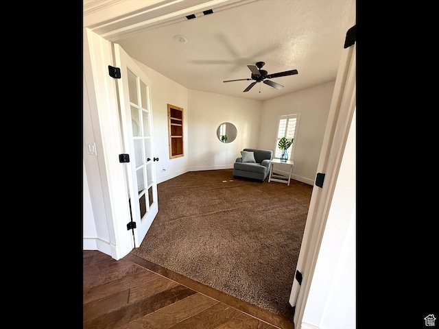 2307 Maple Leaf Dr, Cove, UT 84320 - sitting room with french doors, a ceiling fan, and dark colored carpet