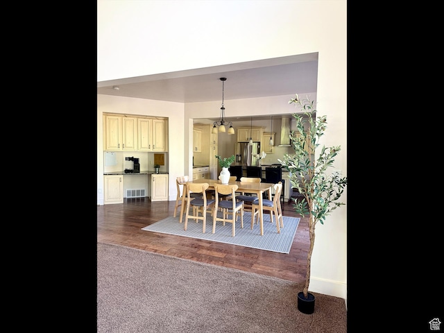 2307 Maple Leaf Dr, Cove, UT 84320 - dining space featuring dark carpet and dark wood-style flooring