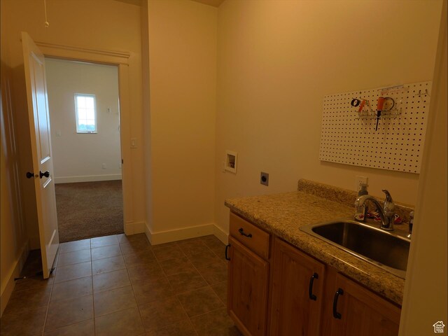 2307 Maple Leaf Dr, Cove, UT 84320 - laundry room with hookup for an electric dryer, baseboards, washer hookup, and dark tile patterned floors