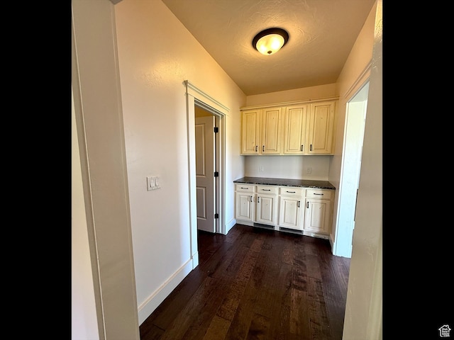 2307 Maple Leaf Dr, Cove, UT 84320 - corridor featuring dark wood finished floors and baseboards